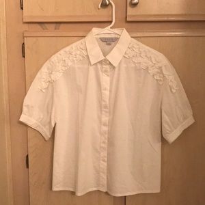White shirt w designed sleeves. size XS